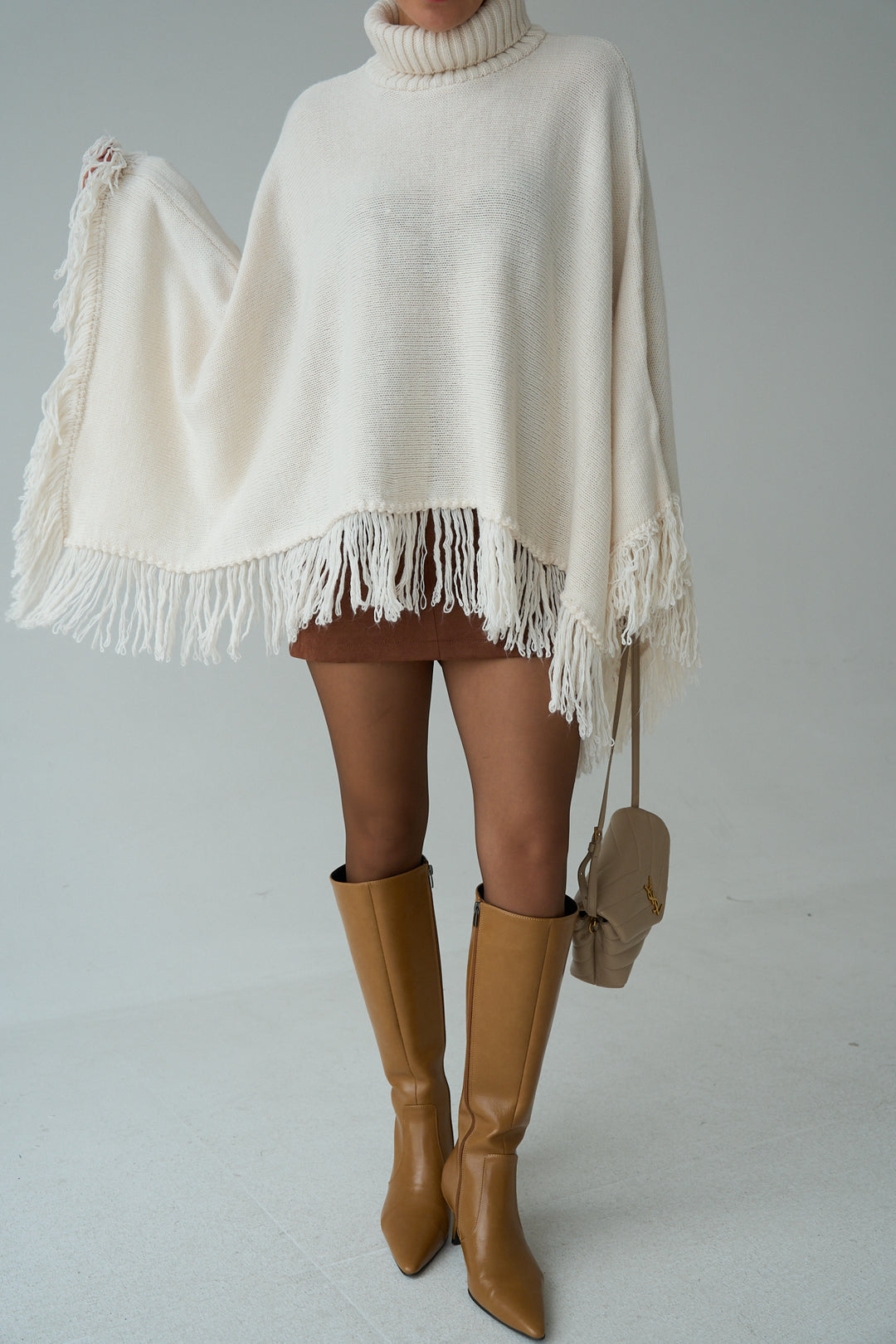 Fringe Hem Turtleneck Poncho – Cream