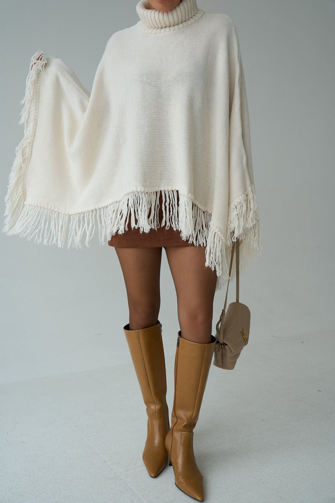 Fringe Hem Turtleneck Poncho – Cream - jqwholesale.com