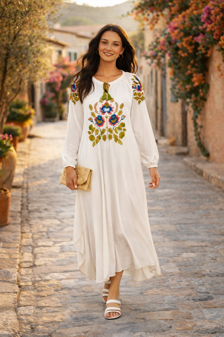 Embroidered Maxi Dress with Tassel Tie Neck in White - jqwholesale.com